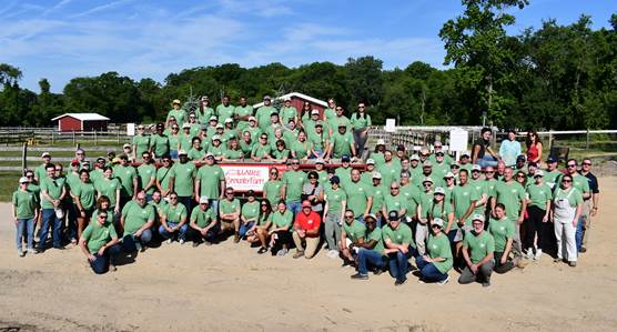 Employees from New Jersey Resources gather at Allaire Community Farm in Wall, NJ as a part of NJR You Days, an annual event designed to give back to the community. Over the course of two days, more than 200 employees helped build, paint, landscape, and refresh facilities at the farm.